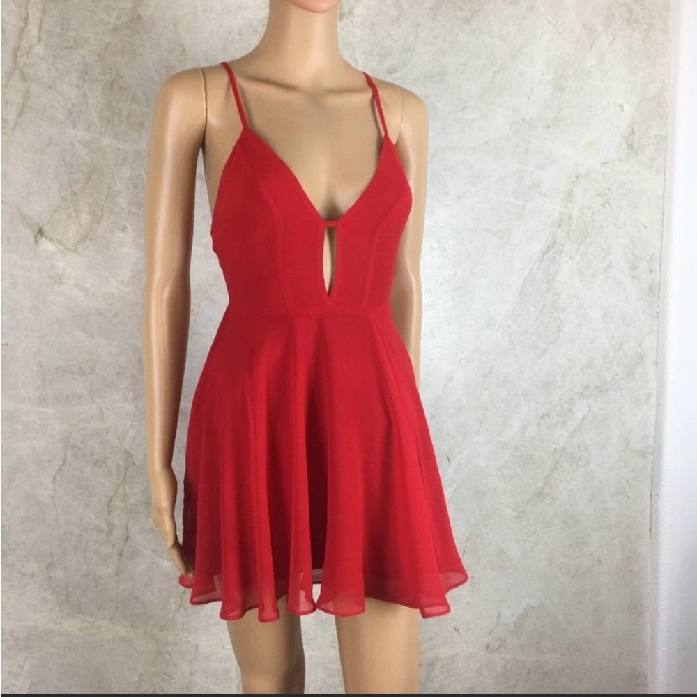 Bebe Cross back Skater Dress. Size 10